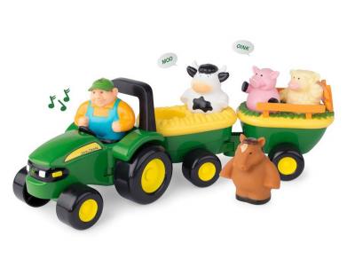 Bild zu Tomy John Deere Tierstimmenzug Traktor mit 2 Anhänger und 4 Figuren mit Sound