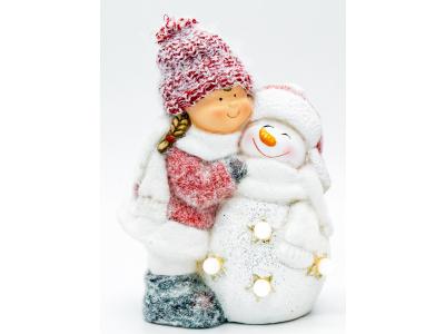 Bild zu Winterkind Wichtel Mädchen mit Schneemann LED Beleuchtung 25 cm
